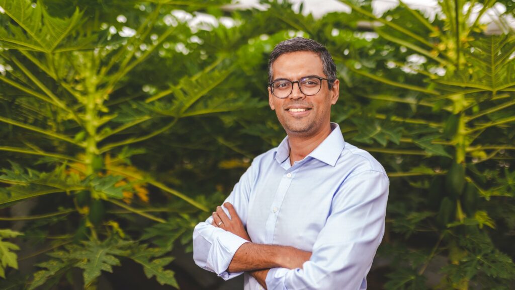 Kheyti Co-founder CEO Kaushik Kappagantulu infront of leaves